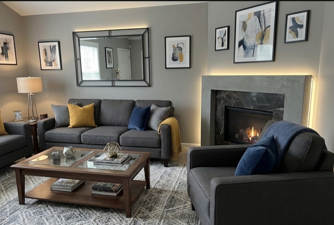 Modern grey-toned living room with fireplace and layered textures